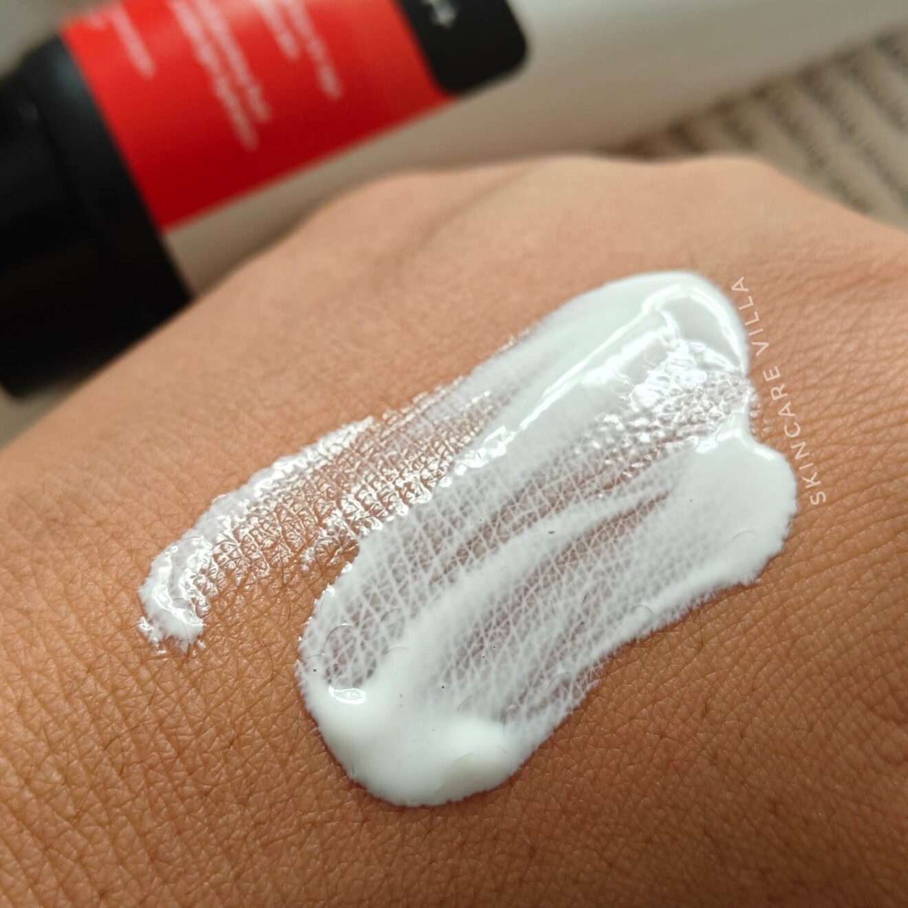 Deconstruct Fluid Brightening Sunscreen Review - Skincare Villa